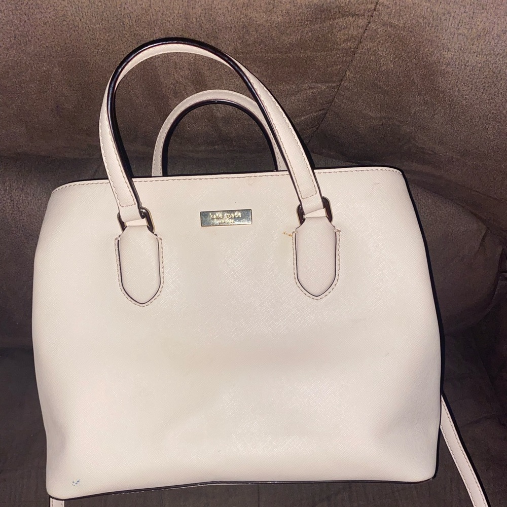 blush pink/nude Kate Spade purse. :)